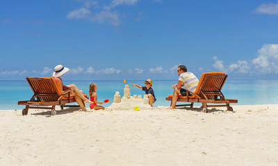 Family Playing at Beach 1464142516